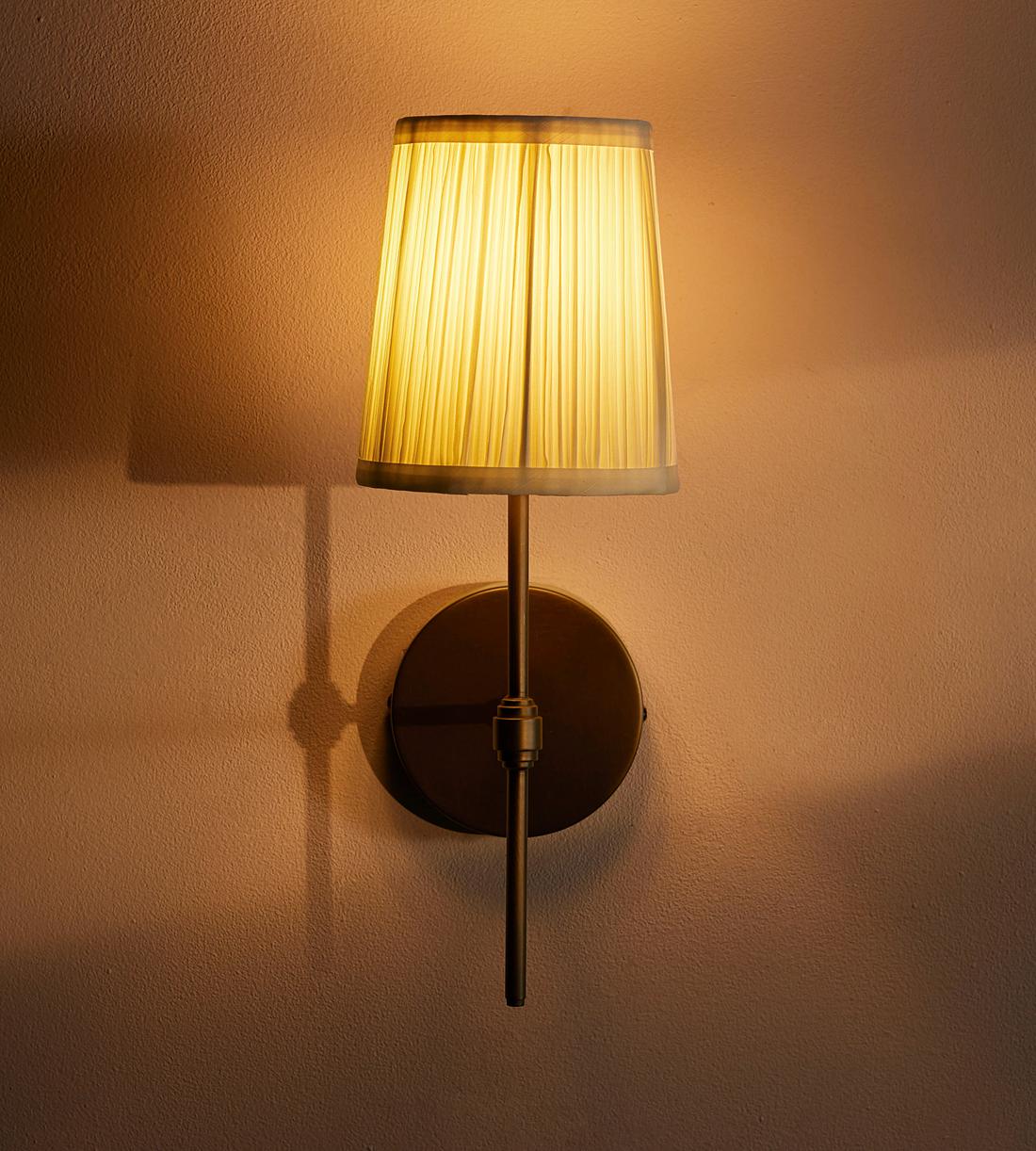 Antiqued Brass Wall Sconce with Linen Shade - Erhaus product image 1